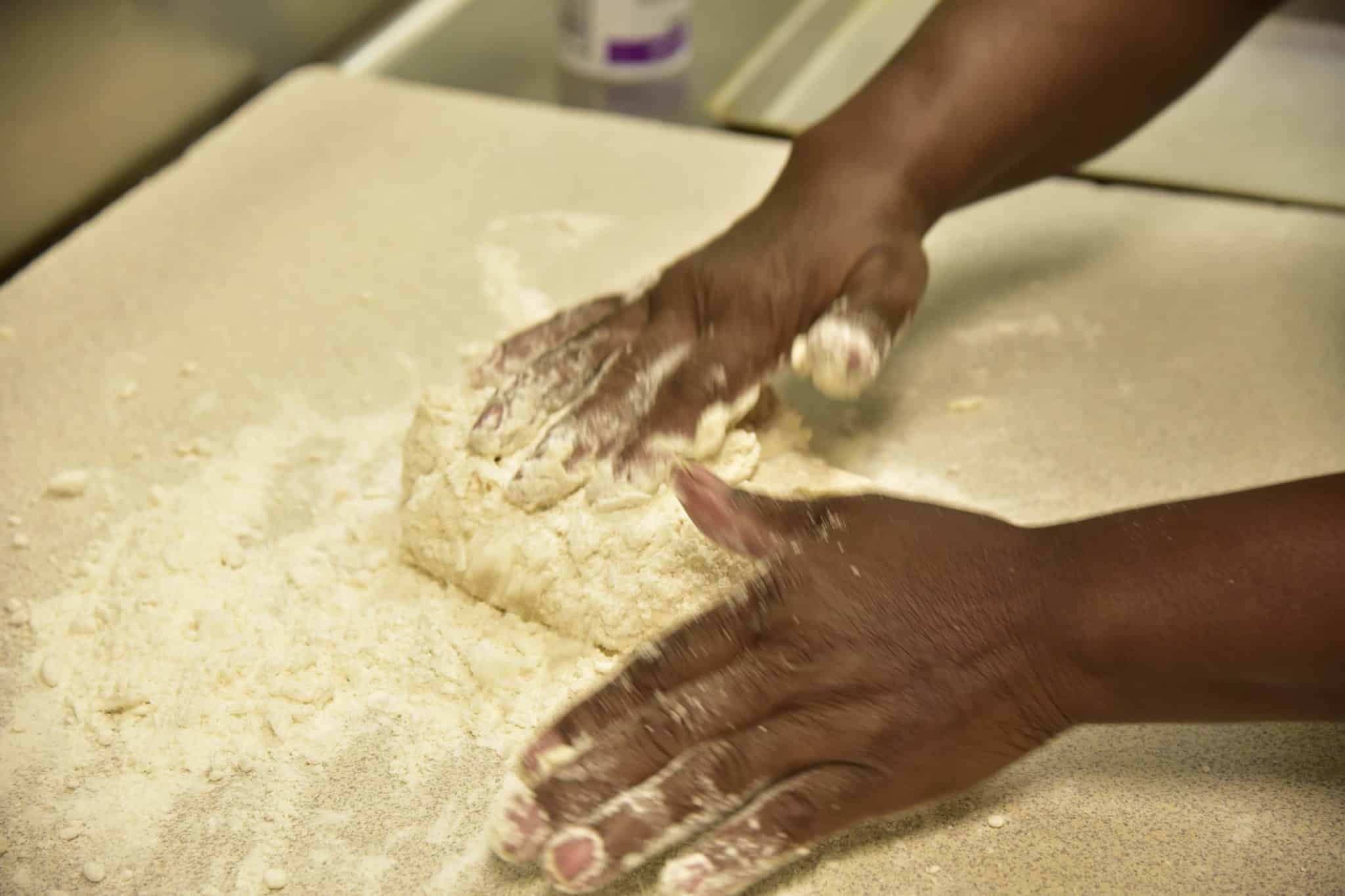 kneading biscuit dough