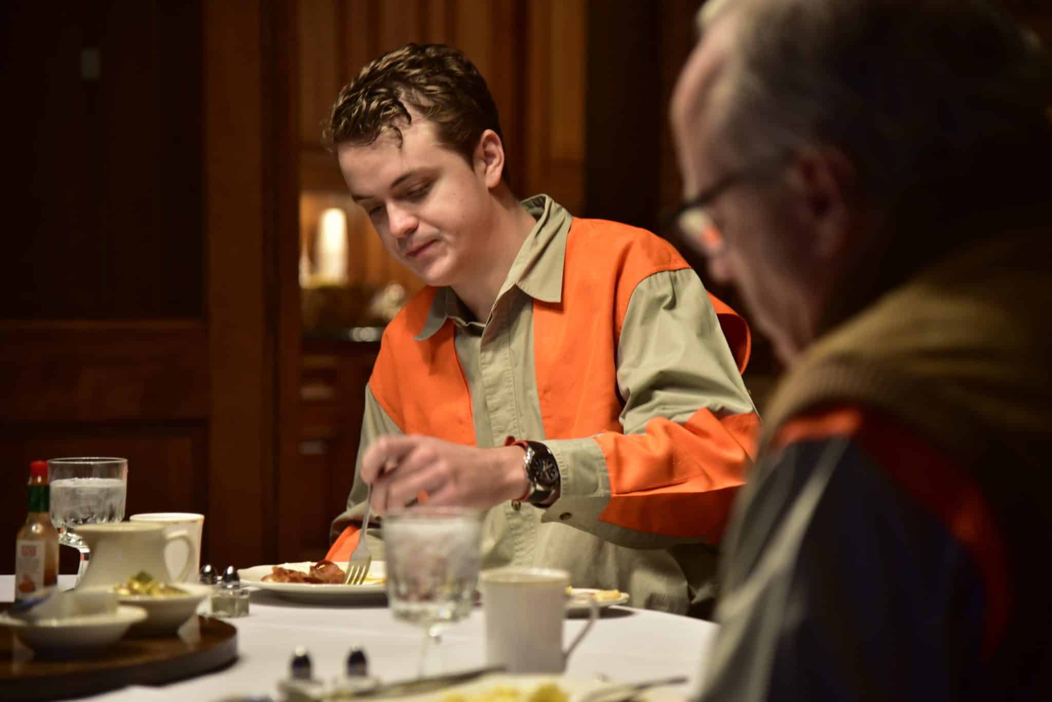 hunter eating at Riverview Plantation lodge