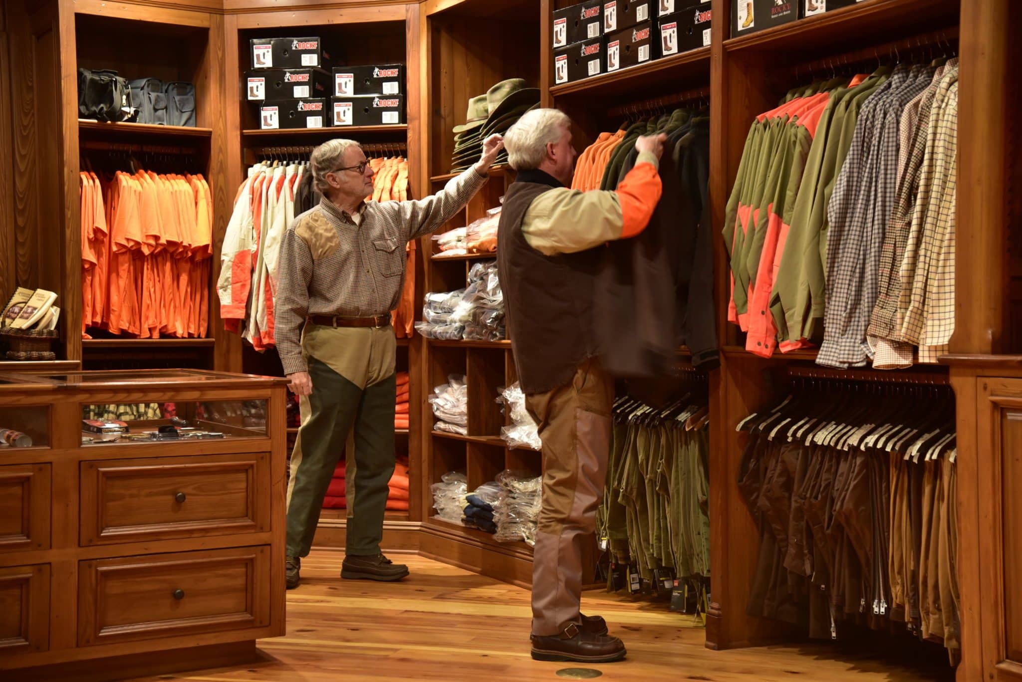 two men shopping at Riverview Plantation's pro shop