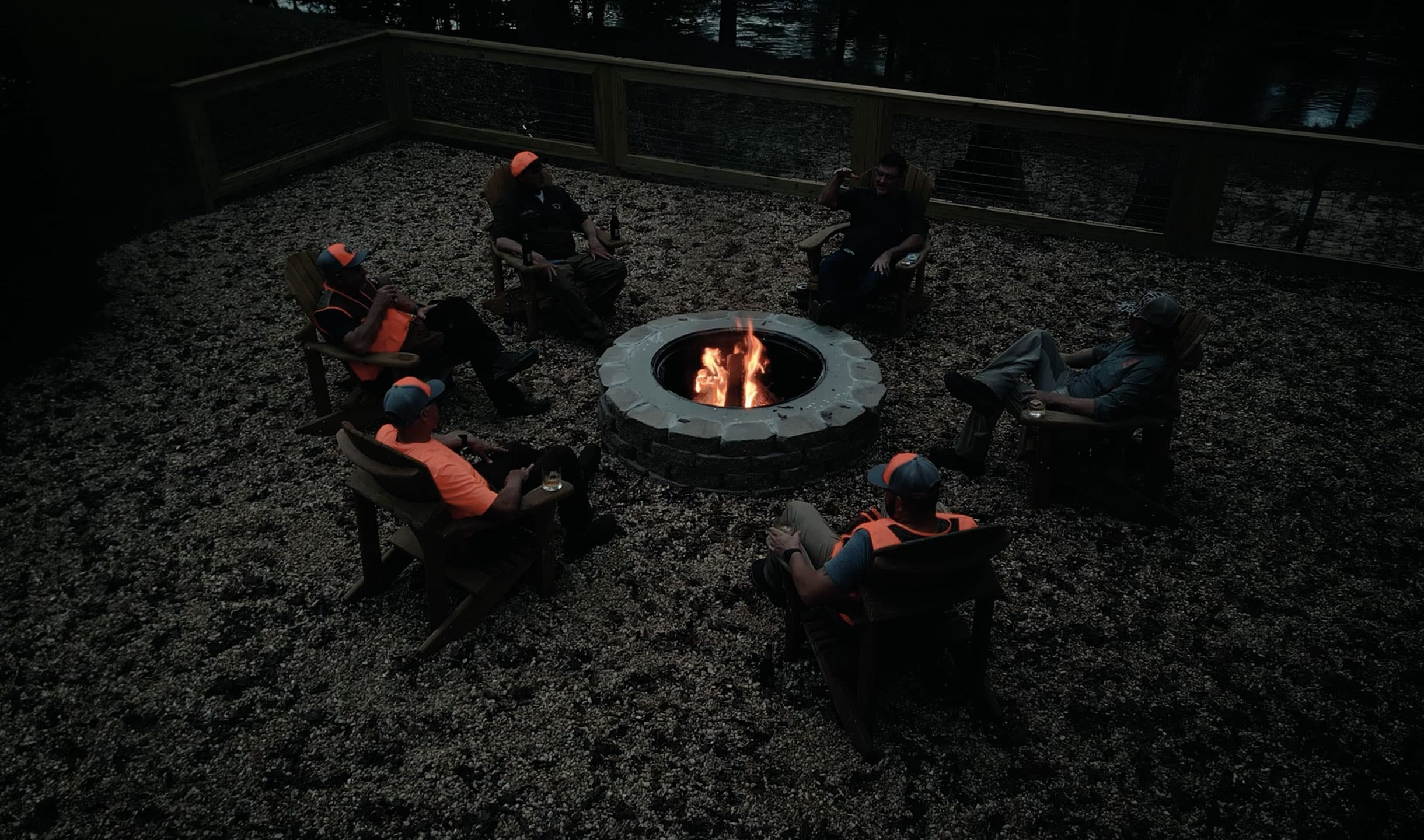 hunters gathered around a firepit