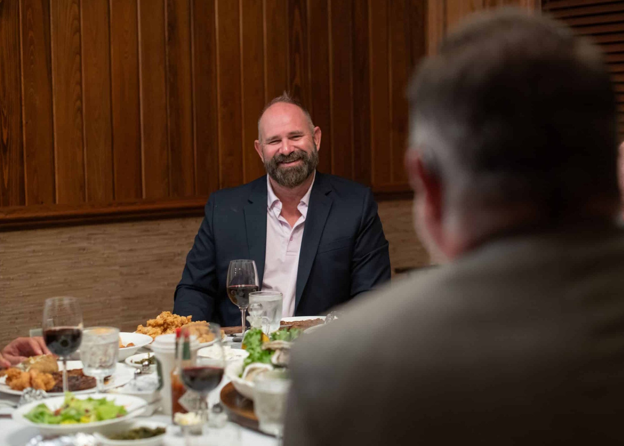 man sitting at dinner table at Riverview Plantation